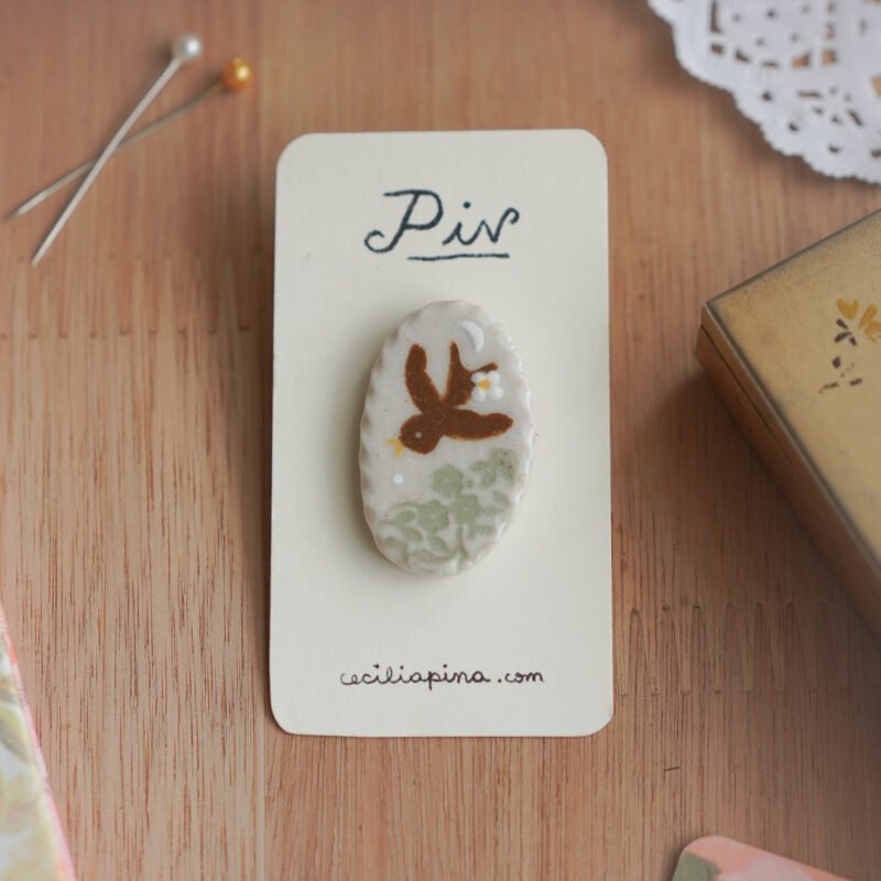 pájaro libre / broche