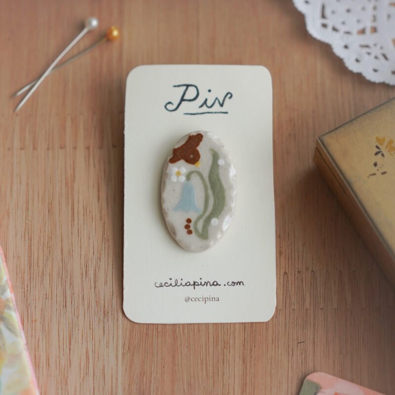 pajaro y campanita celeste / broche