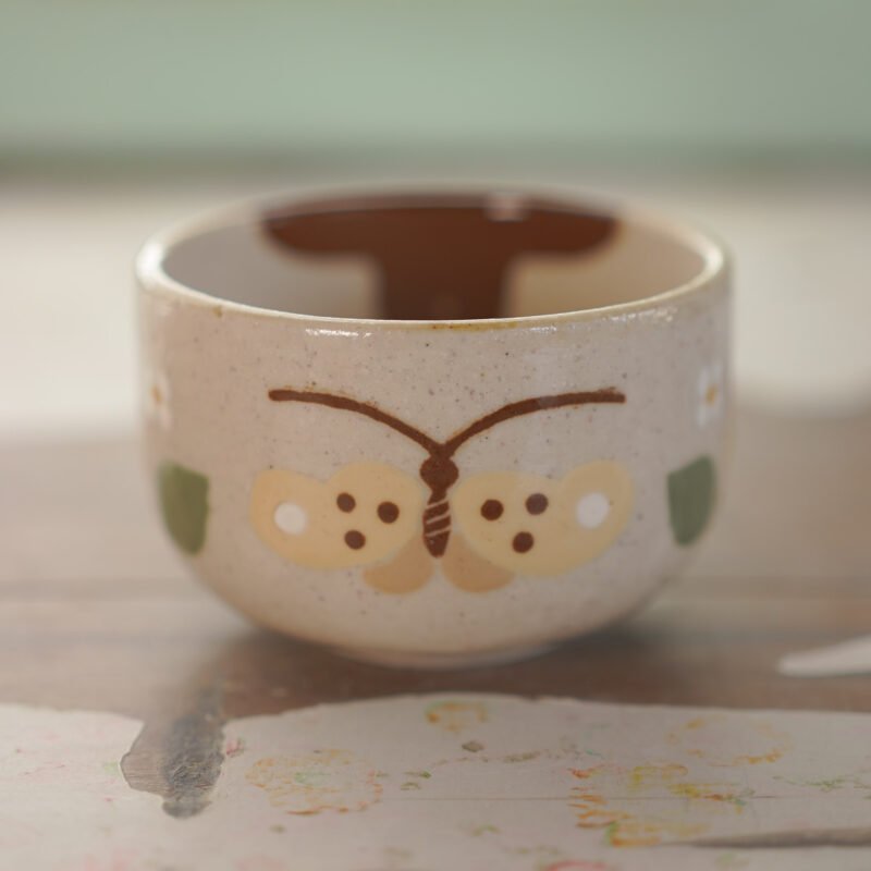 Té / Pájaro con flores amarillas e insectos