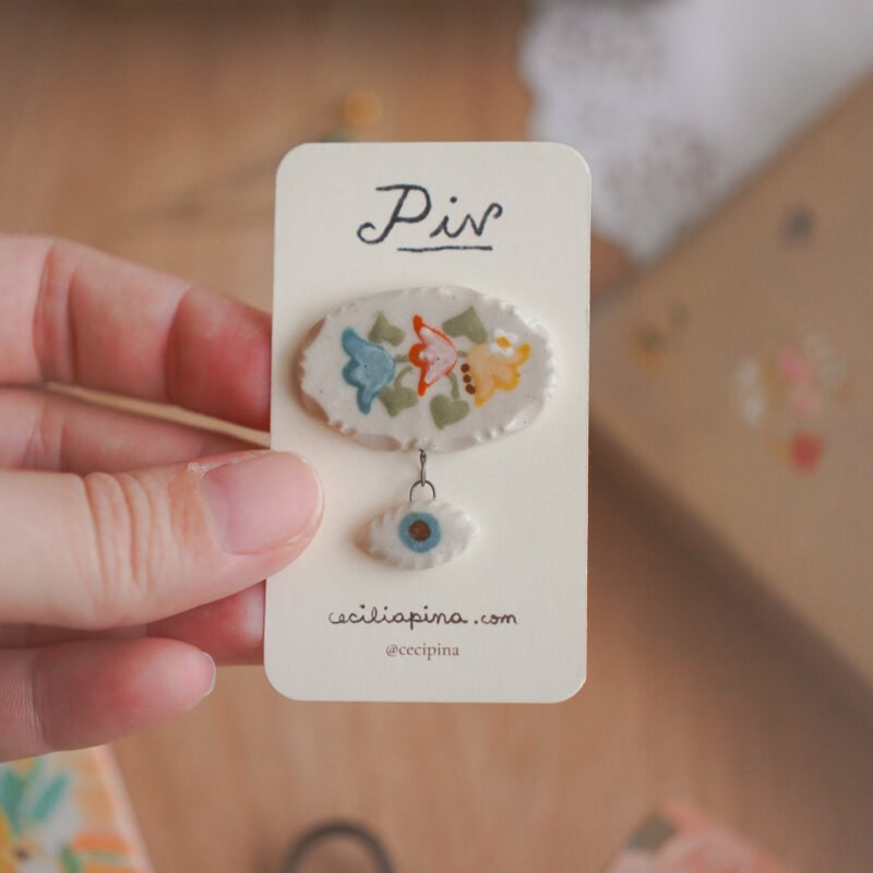 flores tricolor y ojo místico / broche charm